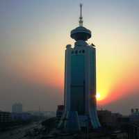Tower in front of the setting sun in Tianjin, China