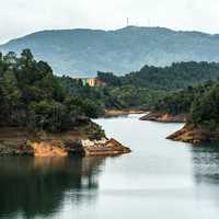 Landscape with river and forest in Guatape, Colombia