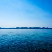 Hills on the Horizon beyond the water in Hvar, Croatia