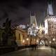 Charles Bridge and night city in Prague, Czech Republic