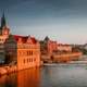 Sunset view of the river and shoreline buildings in Prague, Czech Republic