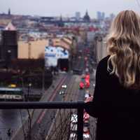 Woman overlooking the city of Prague, Czech Republic