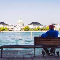 Man Looking at Partial skyline of Copenhagen 