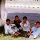 Children Sitting on the ground at Luxor, Egypt