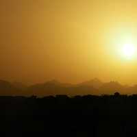 Sun over the desert landscape in Egypt