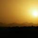 Sun over the desert landscape in Egypt