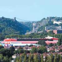 Ashton Gate Stadium, with the Clifton Suspension Bridge over the Avon Gorge in Bristol, England