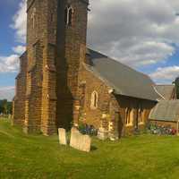 Church next to tombstones and lots of bikes