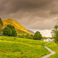 Pathway to house with hills landscape