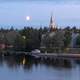  Church of Joensuu on the riverbank under the midnight sun in Finland