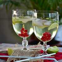 Berries inside drink on a table