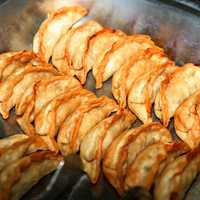 Cooked Gyoza on grill