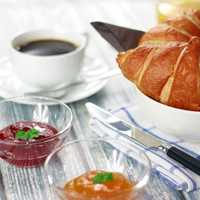 Croissants in a bowl with Jam for breakfast or snack