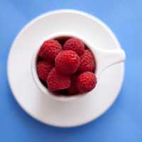 Raspberries in a Cup