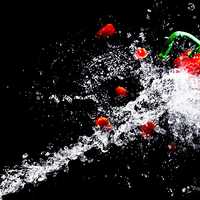 Water squirting on peppers
