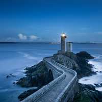Path to the lighthouse at night in Plouzane, France