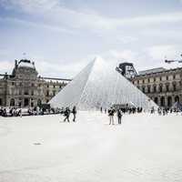 Pyramid of Louvre square in Paris, France