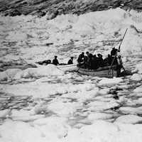 Small Boat moving through the ice