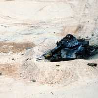 An Iraqi T-54A destroyed in the desert in the Gulf War