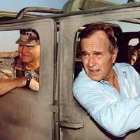 Norman Schwarzkopf, Jr. and President George H. W. Bush visiting troops during the Gulf War