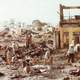 Civilians sort through the ruins of their homes in Cholon in the Vietnam War