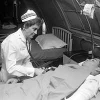 Nurse Treating Soldier in Hospital during the Vietnam War