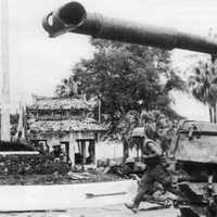 U.S. Marines advance past an M48 Patton tank during the battle for Huế during Vietnam War