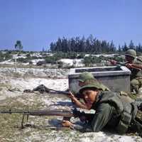 U.S. Marines with M14 rifles battle in Hamo village in Vietnam War