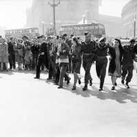 Civilians and service personnel in London celebrating V-J Day in England