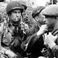 Members of the French Resistance and the U.S. 82nd Airborne division in World War II