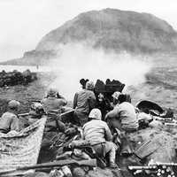 US Marines firing a 37mm Gun at Japanese Cave Positions at Iwo Jima, World War 2