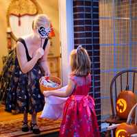 Little Girl Trick or Treating on Halloween
