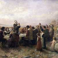 First Thanksgiving at Plymouth , Massachusetts between Pilgrims and Indians