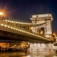 Closeup of the Bridge at night with the lights in Budapest, Hungary