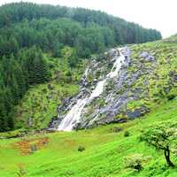 Waterfall on the hillside in Ireland