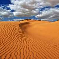 Sand Dunes landscape with sky and clouds in Israel