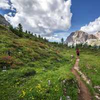 Hiker exploring the Dolomites landscape