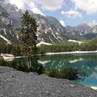 Lakeshore landscape with mountains and nature