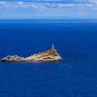 Scoglietto Lighthouse in the middle of the ocean