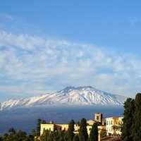 Volcano with snow-capped peak in Italy