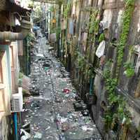 Dirty street back alley in Yangon Myanmar