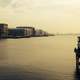 River, tugboats, and landscape in Amsterdam, Netherlands