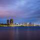 Skyline and Erasmus Bridge at night in Rotterdam, Netherlands