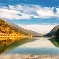 Serene landscape of the Mountains and lake with sky