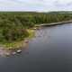 Aerial View of lake shoreline with forest