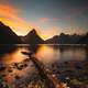 Beautiful landscape with lake and mountains at sunset