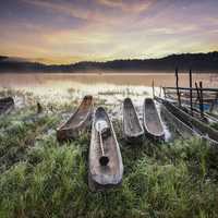 Canoes on the lake shore