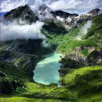 Clouded Valley and lake in the Mountains