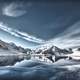 Clouds over the snowy mountains with lake