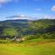 Hills and landscape under the sky and fields